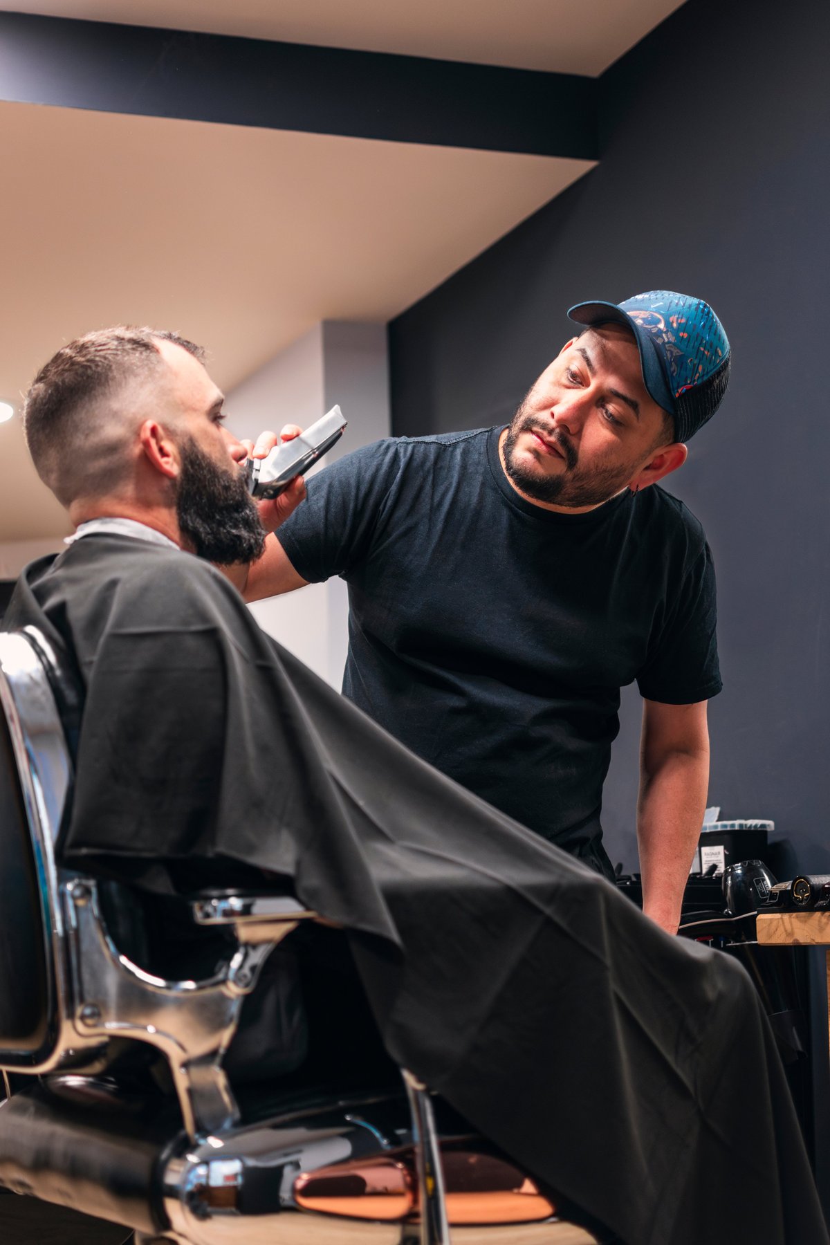Professional barber cutting hair